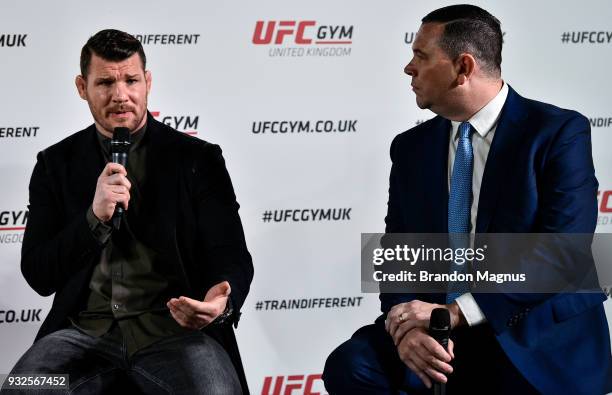 Michael Bisping of England and Joe Long speak to the media during the UFC Gym Press Conference in Glaziers Hall on March 15, 2018 in London, England.