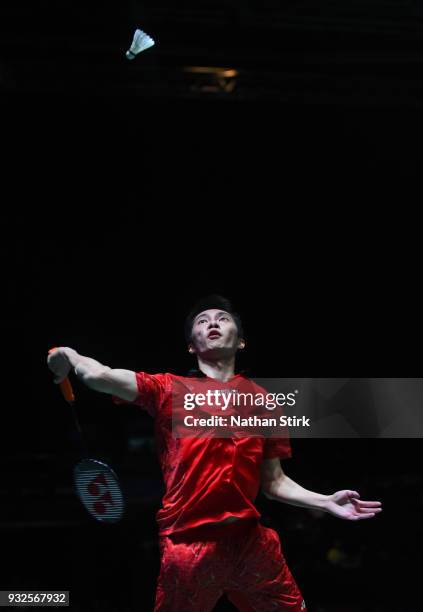 Angus Ng Ka Long of Hong Kong competes against Kenta Nishimoto of Japan on day two of the Yonex All England Open Badminton Championships at Arena...