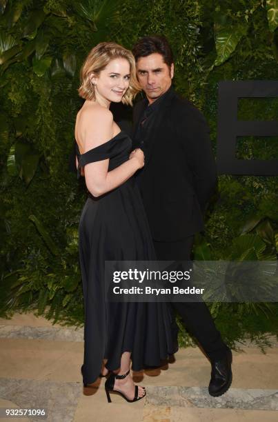 Actors Elizabeth Lail and John Stamos attend the 2018 A+E Upfront on March 15, 2018 in New York City.