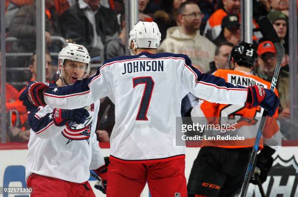 Boone Jenner of the Columbus Blue Jackets celebrates his first period goal against the Philadelphia Flyers with Jack Johnson on March 15, 2018 at the...