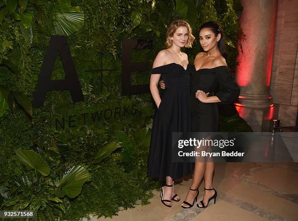 Actresses Elizabeth Lail and Shay Mitchell attend the 2018 A+E... News ...