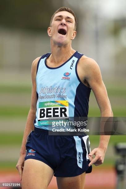 Angus Beer of NSW celebrates winning the Men Under 17 800 Metre final during day three of the Australian Junior Athletics Championships at Sydney...