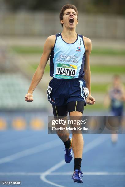 Anthony Vlatko of NSW celebrates winning the Men Under 18 800 Metre final during day three of the Australian Junior Athletics Championships at Sydney...