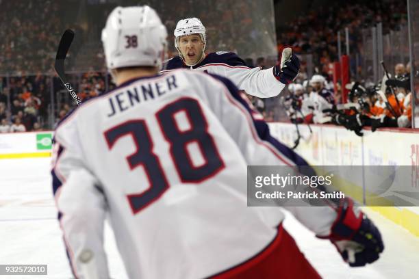 Boone Jenner of the Columbus Blue Jackets celebrates his goal with teammate Jack Johnson against the Philadelphia Flyers during the first period at...