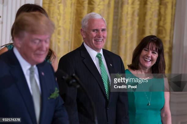 United States Vice President Mike Pence and second lady Karen Pence look on as United States President Donald J. Trump speaks during the Shamrock...