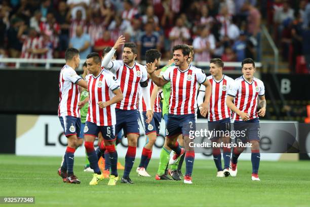 Of Chivas celebrate with teammates after scoring the first goal of his team during the quarterfinals second leg match between Chivas and Seattle...