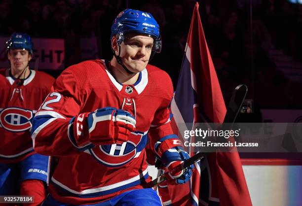 Byron Froese of the Montreal Canadiens skates onto the ice prior to NHL game action against the Pittsburgh Penguins in the NHL game at the Bell...