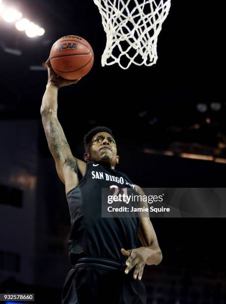 Malik Pope of the San Diego State Aztecs dunks the ball against the Houston Cougars during the first half of the first round of the 2018 NCAA Men's...