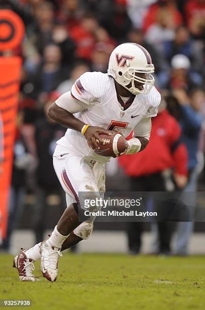 Tyrod Taylor of the Virginia Tech Hokies hands off the ball during a college football game against the Maryland Terrapins on November14, 2009 at...