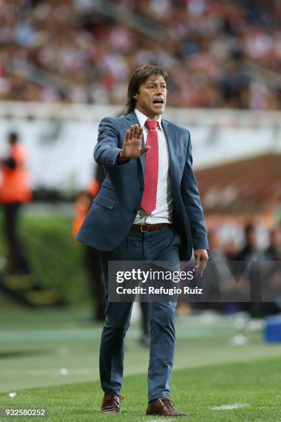 Matias Almeyda, coach of Chivas gives instructions to his players during the quarterfinals second leg match between Chivas and Seattle Sounders as...