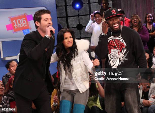 Robin Thicke, "106 & Park" host Rocsi, and 50 Cent visit BET's "106 & Park" at BET Studios on November 19, 2009 in New York City.