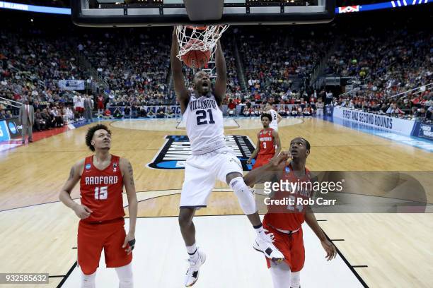 Dhamir Cosby-Roundtree of the Villanova Wildcats dunks the ball against the Radford Highlanders during the second half of the game in the first round...