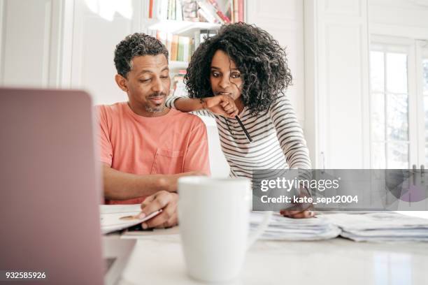 planning budget for home renovation - ethiopian ethnicity stock pictures, royalty-free photos & images