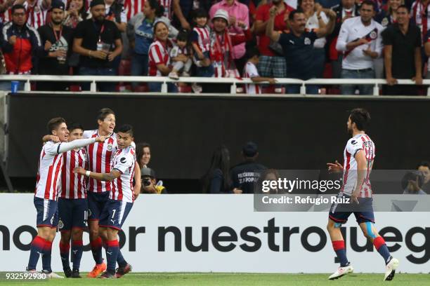 Javier Lopez of Chivas celebrates with his teammates after scoring the second goal of his team during the quarterfinals second leg match between...