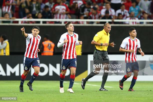 Javier Lopez of Chivas celebrates with his teammates after scoring the second goal of his team during the quarterfinals second leg match between...