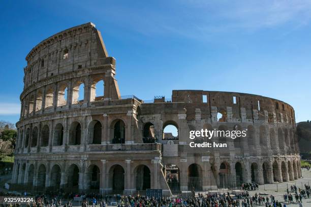 colosseum, rome, against blue sky - stadium general view stock pictures, royalty-free photos & images