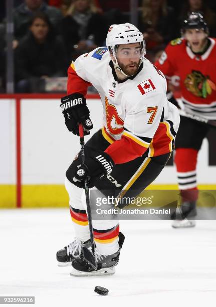 Brodie of the Calgary Flames controls the puck against the Chicago Blackhawks at the United Center on February 6 2018 in Chicago, Illinois. The...