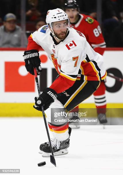 Brodie of the Calgary Flames controls the puck against the Chicago Blackhawks at the United Center on February 6 2018 in Chicago, Illinois. The...