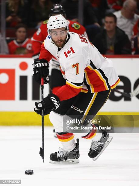 Brodie of the Calgary Flames controls the puck against the Chicago Blackhawks at the United Center on February 6 2018 in Chicago, Illinois. The...