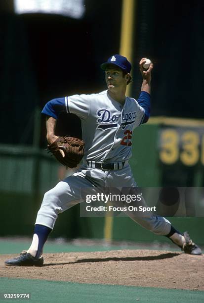 Pitcher Tommy John of the Los Angeles Dodgers pitches during a circa 1970's Major League Baseball game. John played for the Dodgers from 1972-74 and...