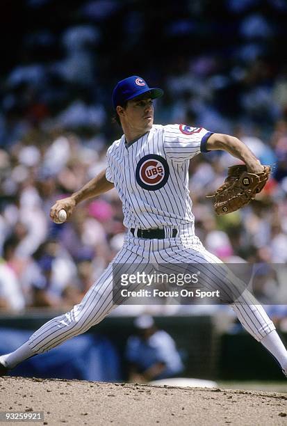 S: Pitcher Greg Maddux of the Chicago Cubs pitches during circa 1980's Major League Baseball game at Wrigley Field in Chicago, Illinois. Maddux...