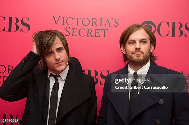 Jared Followill and Caleb Followill of Kings of Leon attend the Victoria's Secret fashion show at The Armory on November 19, 2009 in New York City.