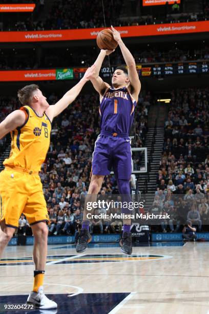 Devin Booker of the Phoenix Suns shoots the ball against the Utah Jazz on March 15, 2018 at vivint.SmartHome Arena in Salt Lake City, Utah. NOTE TO...