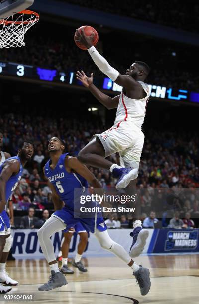 Rawle Alkins of the Arizona Wildcats drives to the basket in the first half against the Buffalo Bulls during the first round of the 2018 NCAA Men's...