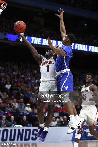 Rawle Alkins of the Arizona Wildcats drives to the basket in the first half against the Buffalo Bulls during the first round of the 2018 NCAA Men's...