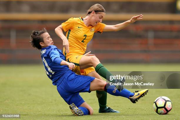 Karly Roestbakken of Australia is challenged by Anuthida Malasri of Thailand during the International match between the Young Matildas and Thailand...