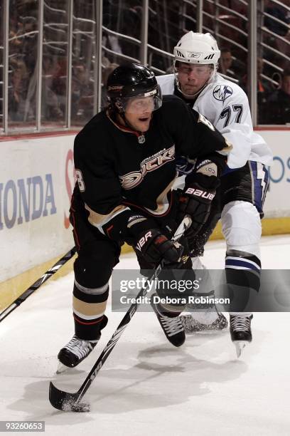 Victor Hedman of the Tampa Bay Lighting reaches in for the puck against Teemu Selanne of the Anaheim Ducks during the game on November 19, 2009 at...