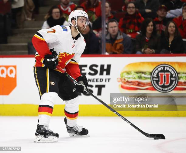 Brodie of the Calgary Flames looks to pass against the Chicago Blackhawks at the United Center on February 6 2018 in Chicago, Illinois. The Flames...