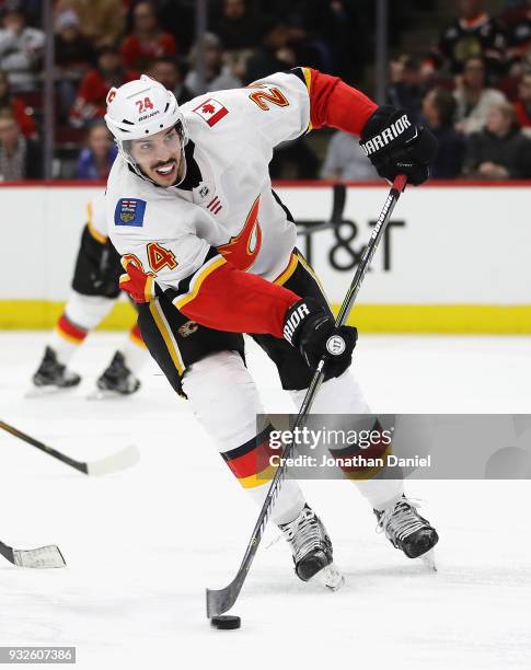 Travis Hamonic of the Calgary Flames passes against the Chicago Blackhawks at the United Center on February 6 2018 in Chicago, Illinois. The Flames...