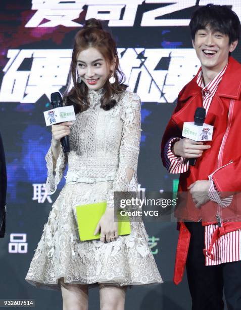 Actor Lin Gengxin and actress Angelababy attend the press conference of variety show 'Clash Bots' on March 15, 2018 in Beijing, China.