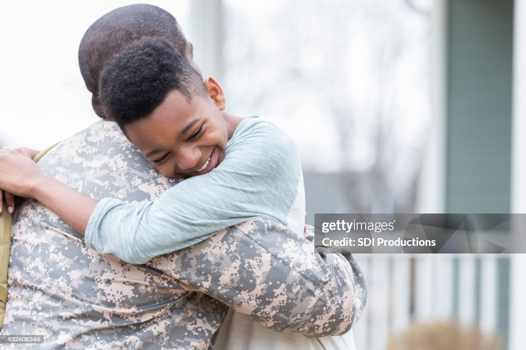 Boy is happy his dad is home from deployment