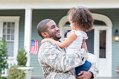 African American soldier returns from overseas
