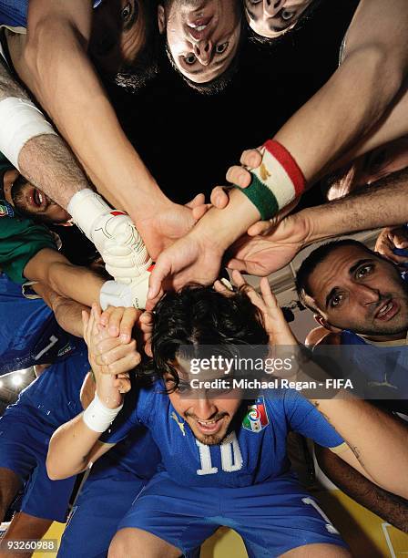 Diego Maradona Jr takes part in the Italian team huddle before the FIFA Beach Soccer World Cup Quarter Final match between Brazil and Italy at Umm...