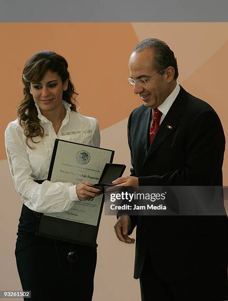 Mexican medalist Paola Espinosa and President of Mexico Felipe Calderon Hinojosa during the ceremony of National Prize of Sports 2009 realized in the...