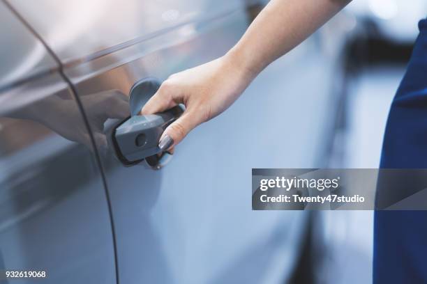 hand open car - car door stock pictures, royalty-free photos & images