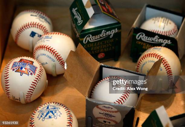 Baseballs, many of them were new, which were waiting to be signed by politicians Tim Russert interviewed, are on display in the Inside Tim Russert's...