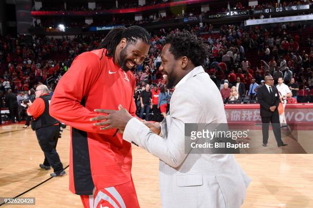 Nene Hilario of the Houston Rockets and Patrick Beverley of the LA Clippers talk after the game on March 15, 2018 at the Toyota Center in Houston,...