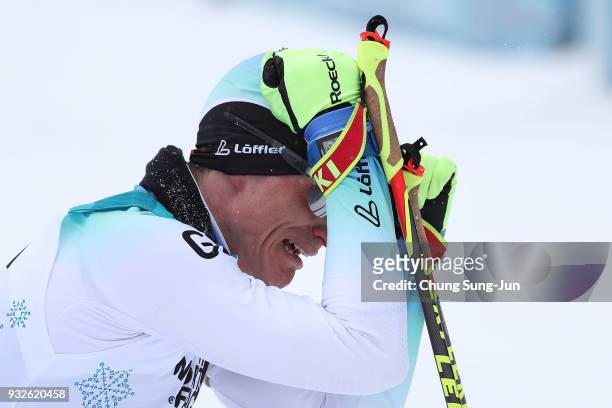 Martin Fleig of Germany celebrates after winning the Biathlon - Men's 15km - Sitting during day seven of the PyeongChang 2018 Paralympic Games on...
