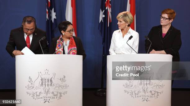 Indonesia's Defence Minister Ryamizard Ryacudu and Foreign Minister Retno Marsudi front the media at a press conference with Australia's Foreign...