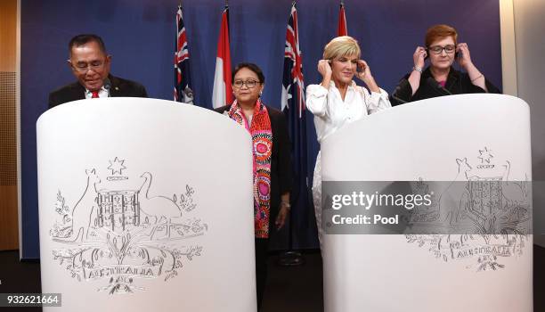 Indonesia's Defence Minister Ryamizard Ryacudu and Foreign Minister Retno Marsudi front the media at a press conference with Australia's Foreign...