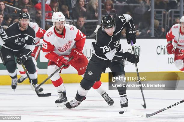 Tyler Toffoli of the Los Angeles Kings handles the puck against Mike Green of the Detroit Red Wings at STAPLES Center on March 15, 2018 in Los...