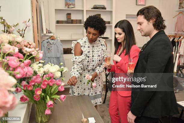 Whit Hazen, Vanessa Marano and guest attend the Ted Baker London SS'18 Launch Dinner on March 15, 2018 in Los Angeles, California.