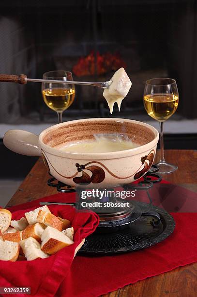 delicious swiss fondue in a pot - fondue stock pictures, royalty-free photos & images