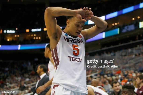 Justin Robinson of the Virginia Tech Hokies reacts after fouling out against the Alabama Crimson Tide late in the second half of the game in the...