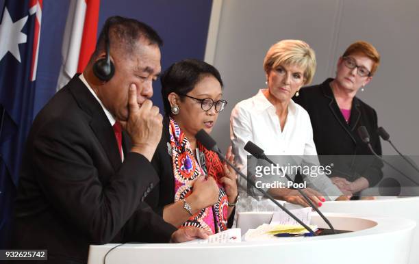 Indonesia's Defence Minister Ryamizard Ryacudu and Foreign Minister Retno Marsudi front the media at a press conference with Australia's Foreign...