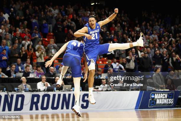 Dominic Johnson of the Buffalo Bulls celebrates with Brock Bertram in the second half against the Arizona Wildcats during the first round of the 2018...